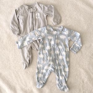 Two Carter's Newborn Onesies. One Blue with Sheep and the other w/ Grey Stripes.